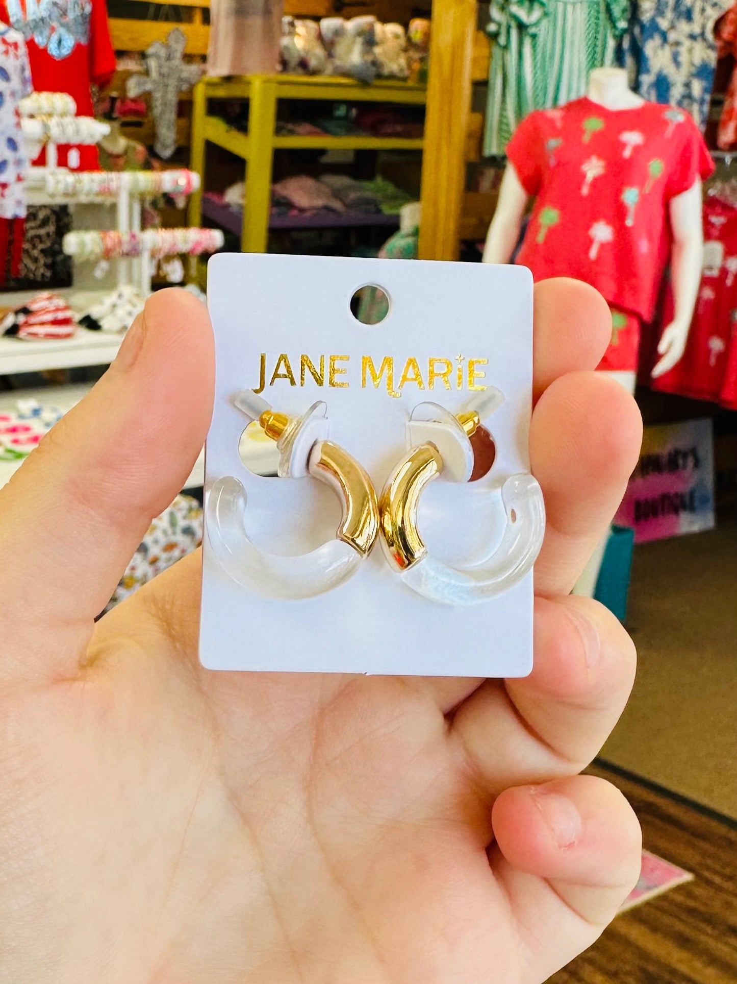 Jane Marie Gold Clear Open Wavy Hoops