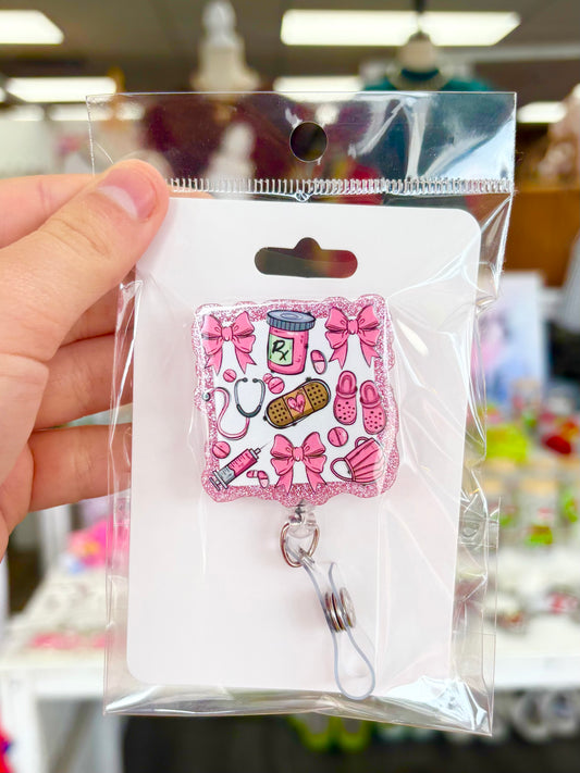 KK Bow Medicine Badge Reel