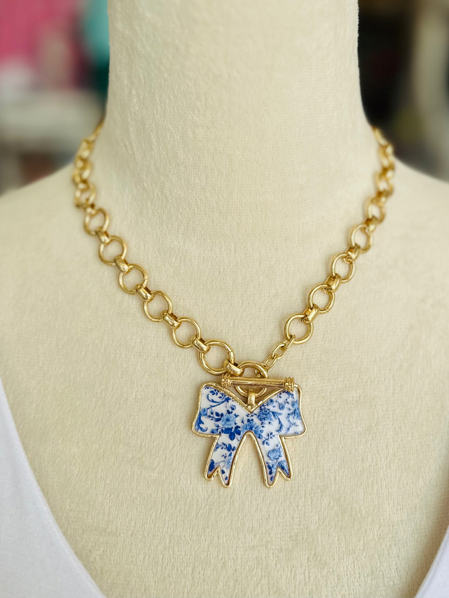 Blue Floral And Gold Bow Toggle Necklace